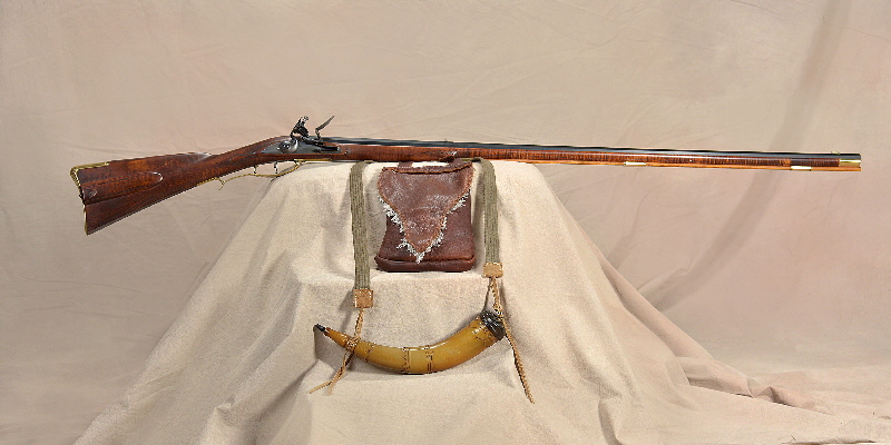 Rifle an accoutrements that include a leather pouch and powder horn will be a Foort Boonesborough Foundation fund raiser in 2026